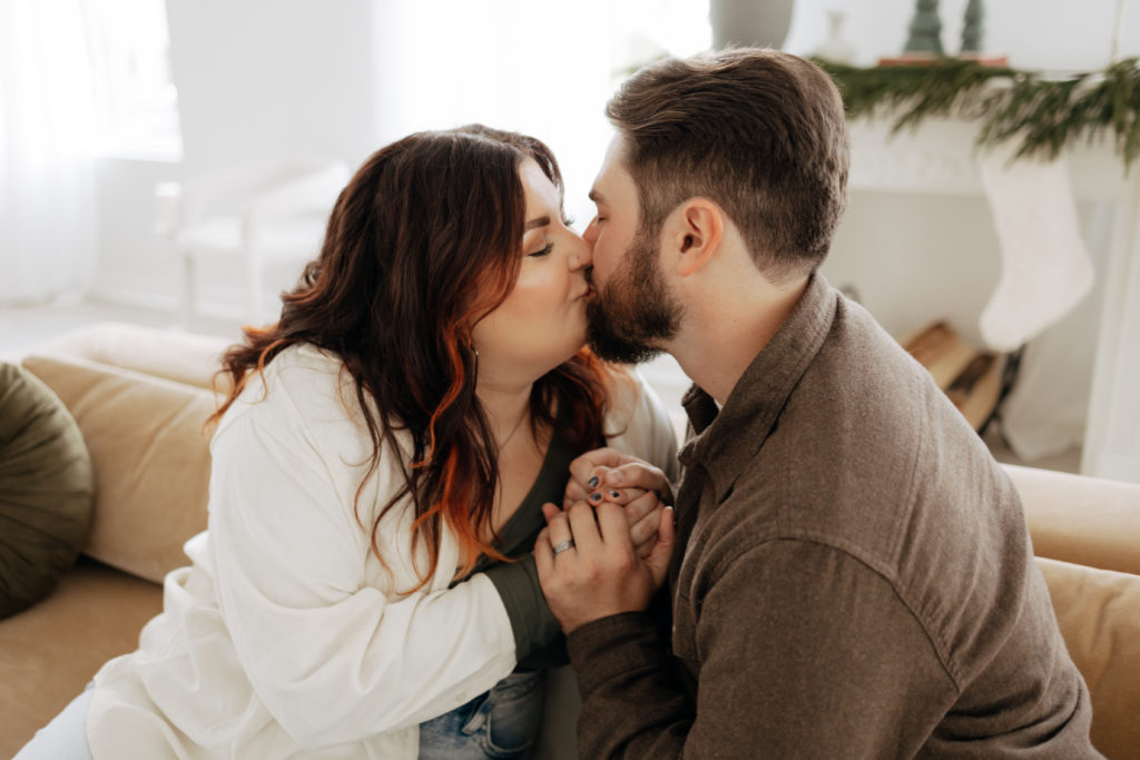 Christmas photoshoot studio session couple kissing